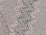 a close up of a piece of lace on a table