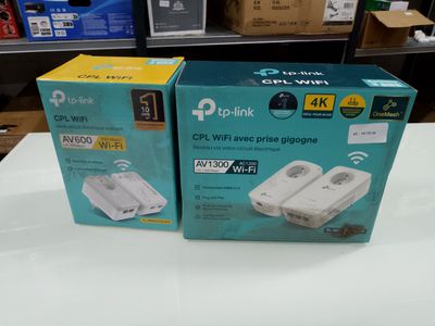 two boxes that are sitting on a table