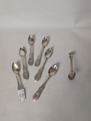 a lot of silver spoons and spoon spoons on the table