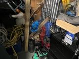 a room with a lot of clutter and tools