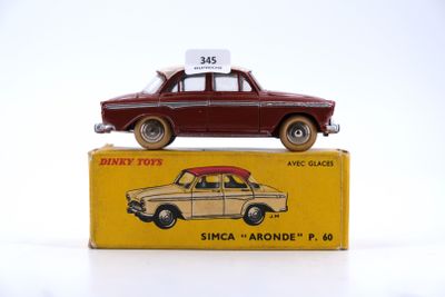 a small toy car sitting on top of a box