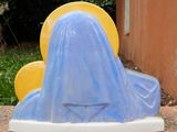 a statue of a woman with a veil on her head