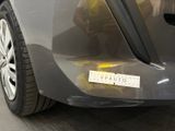 a close up of a car with a sticker on it ' s bumper