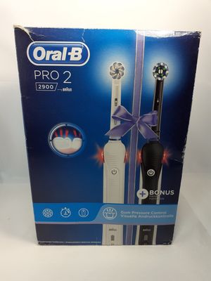 an image of a box of electric toothbrushes on a white surface
