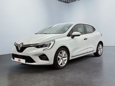 a white car in a white room with a black floor