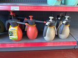 many different types of spray bottles on the shelf