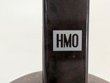 an image of a bottle of alcohol with a sticker on it