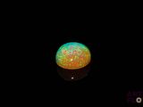 an image of a glowing ball in the dark with a black background