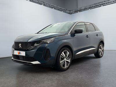 the new peugeot suv is parked in a large room