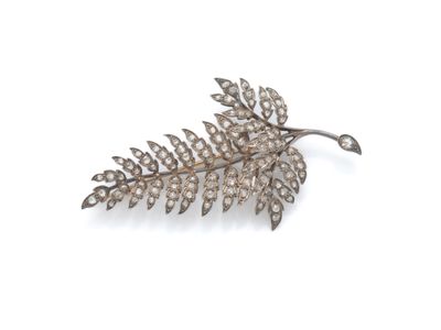 une broche en diamant et feuille d'argent