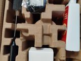 a cardboard box with a bunch of items inside of it