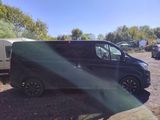 a van that is parked next to a camper trailer