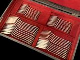 silverware in a red case on a black background