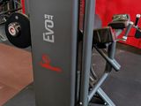 a gym room with a tread machine and other equipment in it