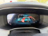 a car in the rear view mirror of a car