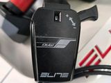 a close up of a bike with a charger on it