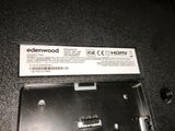 a close up of a black electronic device with a label on it