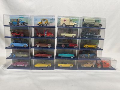 a lot of toy cars that are in a display case