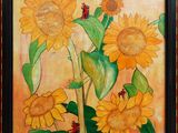 un tableau représentant des tournesols avec des coccinelles posées dessus