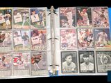 an image of a baseball card album with a lot of baseball cards