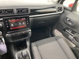 the interior of a car with a dashboard and steering controls