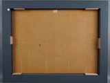 an image of a picture of a black frame with a cork board in it