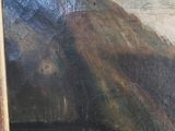 a picture of a painting of a mountain in a wooden frame