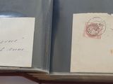 an open book with a bunch of stamps on it