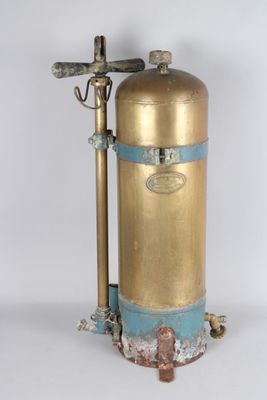 a gold and blue fire hydrant on a white background