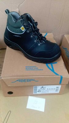 a pair of shoes that are on top of a box