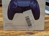 the box is empty on the table with the game controller in it