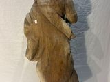 statue of a woman holding a child in her arms