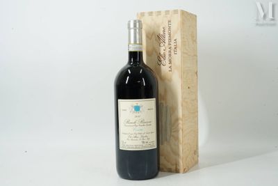 a bottle of wine sitting next to a wooden box