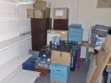 a room with a lot of boxes and boxes on the floor