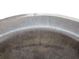 a close up view of a metal pan with a handle