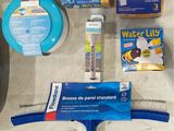 a lot of cleaning supplies on the counter top