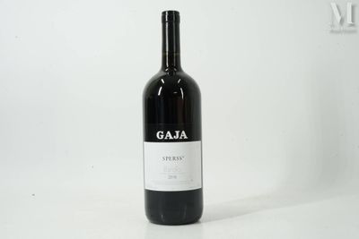 a bottle of wine that is sitting on a table