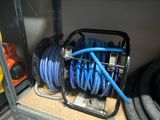 a shelf with a bunch of hoses on it