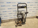 an image of a machine that is sitting in front of a wall