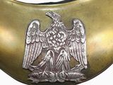 a gold collar with a silver eagle on it