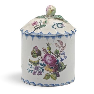 an image of a decorative container with flowers on it