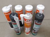 several different types of glues are lined up in a row