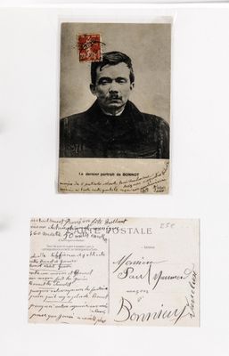 an old photo of a man with a mustache and a postcard