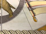 a drawing of a cat in a wheel on a wall