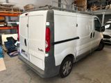 a white van that is parked in a garage