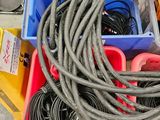 a bunch of wires in a container on the ground