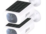 two cameras that are sitting side by side on a white surface
