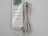 a remote control that is connected to a charger