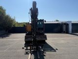 an image of a forklift parked in a parking lot