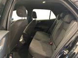 the back seats of a car are empty and the passenger seat is empty